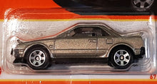 Load image into Gallery viewer, Matchbox 2024 1986 Toyota MR2 Champagne #67 MBX Showroom New Sealed Box