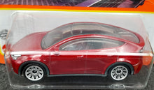 Load image into Gallery viewer, Matchbox 2022 Tesla Model Y Red #18 MBX Metro New Long Card