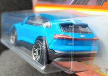 Load image into Gallery viewer, Matchbox 2022 Audi E-Tron Blue #77 MBX Metro New Long Card