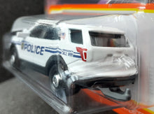 Load image into Gallery viewer, Matchbox 2022 2016 Ford Interceptor Utility White MBX Metro #92/100 New Long Card