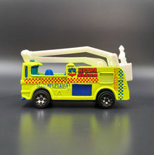 Load image into Gallery viewer, Matchbox 2002 Snorkel Fire Truck Neon Yellow #14 Emergency 2/4