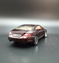 Load image into Gallery viewer, Matchbox 2006 Mercedes-Benz CLS500 Maroon #2 MBX Metal