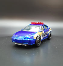 Load image into Gallery viewer, Matchbox 2010 2000 Chevrolet Impala Dark Blue #57 Emergency Response 7/8