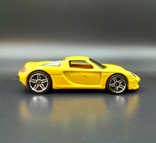 Load image into Gallery viewer, Hot Wheels 2009 Porsche Carrera GT Yellow #9/10 Dream Garage