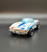 Load image into Gallery viewer, Hot Wheels 2012 '65 Corvette White #166 HW Main Street 6/10