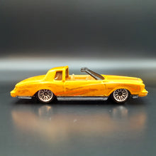 Load image into Gallery viewer, Hot Wheels 2001 Montezooma Dark Yellow #23/36 First Editions