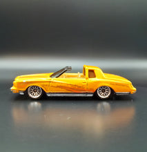Load image into Gallery viewer, Hot Wheels 2001 Montezooma Dark Yellow #23/36 First Editions