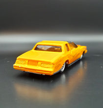 Load image into Gallery viewer, Hot Wheels 2001 Montezooma Dark Yellow #23/36 First Editions
