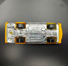 Load image into Gallery viewer, Hot Wheels 2001 Montezooma Dark Yellow #23/36 First Editions