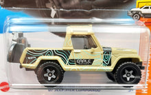 Load image into Gallery viewer, Hot Wheels 2023 '67 Jeepster Commando Tan #94 HW Hot trucks 2/10 New Long Card