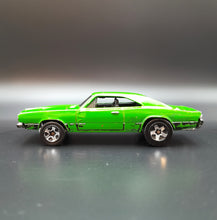 Load image into Gallery viewer, Hot Wheels 2008 '69 Dodge Charger Green #135 Muscle Mania 3/4