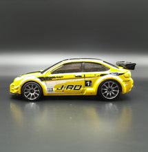 Load image into Gallery viewer, Hot Wheels 2008 '08 Ford Focus Yellow #31 New Models 31/40