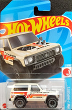 Load image into Gallery viewer, Hot Wheels 2023 Nissan Patrol Custom Ivory #20 HW J-Imports 1/10 New Long Card