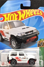 Load image into Gallery viewer, Hot Wheels 2023 Mitsubishi Pajero Evolution White #175 Mud Studs 3/5 New Long Card