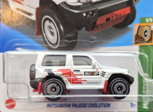 Load image into Gallery viewer, Hot Wheels 2023 Mitsubishi Pajero Evolution White #175 Mud Studs 3/5 New Long Card