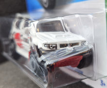 Load image into Gallery viewer, Hot Wheels 2023 Mitsubishi Pajero Evolution White #175 Mud Studs 3/5 New Long Card