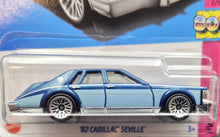 Load image into Gallery viewer, Hot Wheels 2023 '82 Cadillac Seville Dark Blue #75 HW: The '80s 7/10 New Long Card