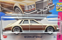 Load image into Gallery viewer, Hot Wheels 2023 '82 Cadillac Seville Gold #75 HW: The '80s 7/10 New