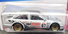 Load image into Gallery viewer, Hot Wheels Hot Wheels 2023 '87 Ford Sierra Cosworth Silver #2 HW: The 80s 1/10 New Long Card