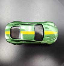 Load image into Gallery viewer, Hot Wheels 2021 Aston Martin V8 Vantage Green HW Exotics 5 Pack Loose