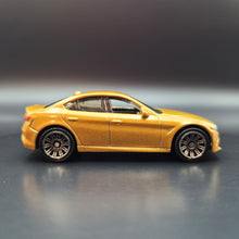 Load image into Gallery viewer, Matchbox 2023 2016 Alfa Romeo Giulia Gold Autobahn Express IV 5 Pack Exclusive