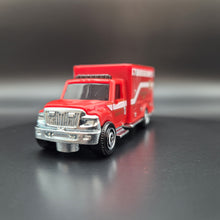 Load image into Gallery viewer, Hot Wheels 2022 International Workstar Ambulance Red MBX Service 5 Pack Exclusive