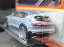 Load image into Gallery viewer, Matchbox 2023 Audi E-Tron Silver #1 MBX Metro 1/100 New Long Card