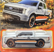 Load image into Gallery viewer, Matchbox 2023 Ford F-150 Lightning Silver #20 MBX 70 Years Special Edition New Long Card