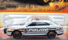 Load image into Gallery viewer, Matchbox 2023 Ford Police Interceptor Silver MBX 70 Years Special Edition #23/100 New