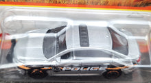 Load image into Gallery viewer, Matchbox 2023 Ford Police Interceptor Silver MBX 70 Years Special Edition #23/100 New