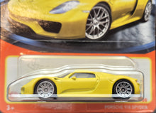 Load image into Gallery viewer, Matchbox 2023 Porsche 918 Spyder Yellow #77 MBX Showroom New Long Card
