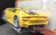 Load image into Gallery viewer, Matchbox 2023 Porsche 918 Spyder Yellow #77 MBX Showroom New Long Card