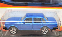 Load image into Gallery viewer, Matchbox 2023 1986 Volvo 240 Light Blue #99 MBX Showroom New Long Card