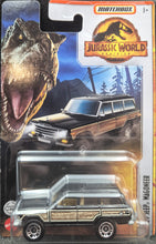 Load image into Gallery viewer, Matchbox 2022 '89 Jeep Wagoneer Black Jurassic World Dominion New Long Card