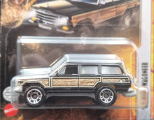 Load image into Gallery viewer, Matchbox 2022 '89 Jeep Wagoneer Black Jurassic World Dominion New Long Card