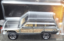 Load image into Gallery viewer, Matchbox 2022 '89 Jeep Wagoneer Black Jurassic World Dominion New Long Card