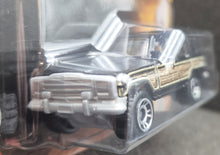 Load image into Gallery viewer, Matchbox 2022 '89 Jeep Wagoneer Black Jurassic World Dominion New Long Card