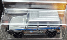 Load image into Gallery viewer, Matchbox 2022 '14 Mercedes-Benz G 550 Silver Jurassic World Dominion New Long Card