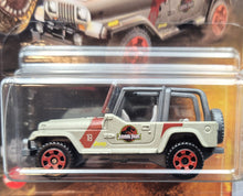 Load image into Gallery viewer, Matchbox 2022 '93 Jeep Wrangler #18 Matte Sand Jurassic World Dominion New Long Card