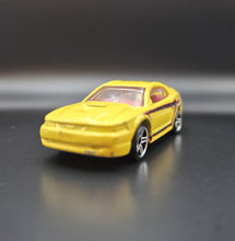 Load image into Gallery viewer, Hot Wheels 2011 '99 Mustang Yellow Team Hot Wheels Commemorative Loose