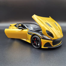Load image into Gallery viewer, Explorafind 2023 Aston Martin DBS Coupe Yellow 1:24 Die Cast Car