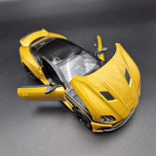 Load image into Gallery viewer, Explorafind 2023 Aston Martin DBS Coupe Yellow 1:24 Die Cast Car