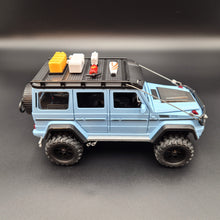 Load image into Gallery viewer, Explorafind 2019 Mercedes-Benz G550 4x4 Squared Sky Blue 1:24 Die Cast SUV