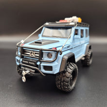 Load image into Gallery viewer, Explorafind 2019 Mercedes-Benz G550 4x4 Squared Sky Blue 1:24 Die Cast SUV