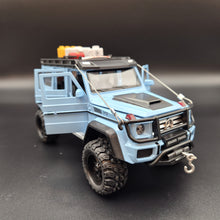 Load image into Gallery viewer, Explorafind 2019 Mercedes-Benz G550 4x4 Squared Sky Blue 1:24 Die Cast SUV
