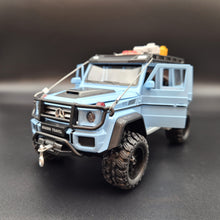 Load image into Gallery viewer, Explorafind 2019 Mercedes-Benz G550 4x4 Squared Sky Blue 1:24 Die Cast SUV