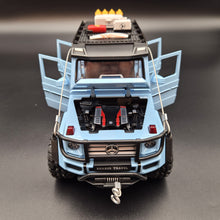 Load image into Gallery viewer, Explorafind 2019 Mercedes-Benz G550 4x4 Squared Sky Blue 1:24 Die Cast SUV