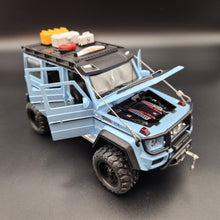Load image into Gallery viewer, Explorafind 2019 Mercedes-Benz G550 4x4 Squared Sky Blue 1:24 Die Cast SUV