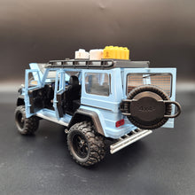 Load image into Gallery viewer, Explorafind 2019 Mercedes-Benz G550 4x4 Squared Sky Blue 1:24 Die Cast SUV
