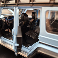 Load image into Gallery viewer, Explorafind 2019 Mercedes-Benz G550 4x4 Squared Sky Blue 1:24 Die Cast SUV